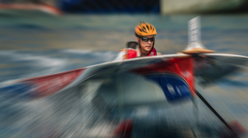 a man pilots the world speed holder Clavis Victron solar boat