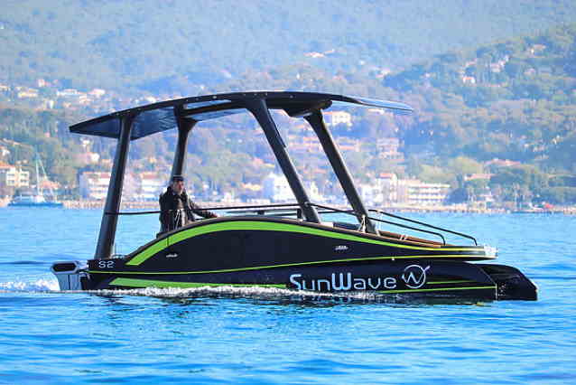Electric boat with solar panels built into the roof